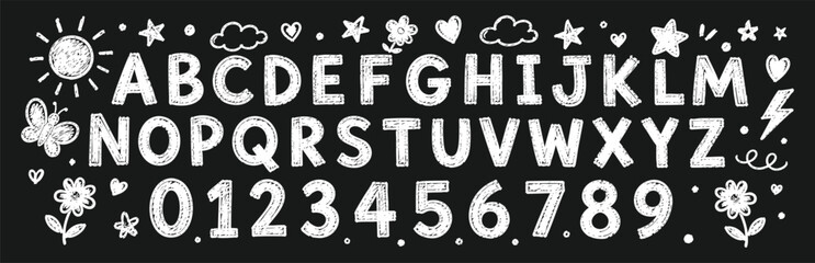 Set of hand drawn chalk alphabet letters and numbers on a dark blackboard background, featuring decorative doodles like stars, hearts, and flowers. © Zbrake Studio
