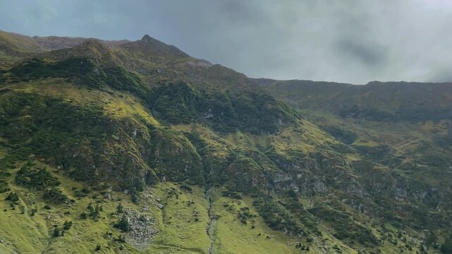 Alpine Slopes in the Fagaras Mountains Along the Transfagarasan, Romania. Concept of mountain wilderness, alpine travel and natural landscapes.