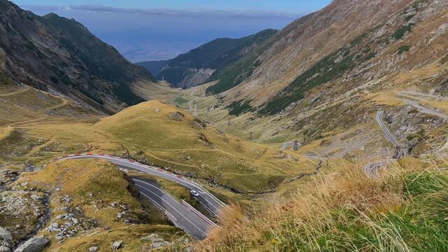 Winding Transfagarasan Road Through the Fagaras Mountains in Romania. Concept of scenic driving, mountain travel and iconic Carpathian landscapes.