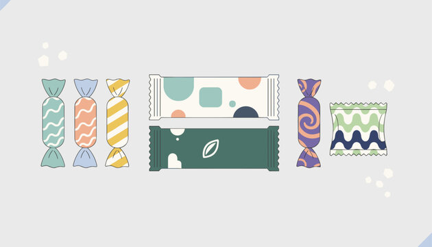 Collection of wrapped sweet candies and chocolate snack bars with colorful abstract geometric pattern package wrappers.