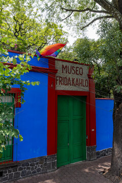 Iconic Museum: Entrance Gate of the Museo Frida Kahlo (Casa Azul) Flying a Rainbow Pride Flag in Coyoac&aacute;n, Mexico City (CDMX)