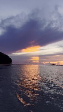 Slow Motion of Sunset Over Ocean Water