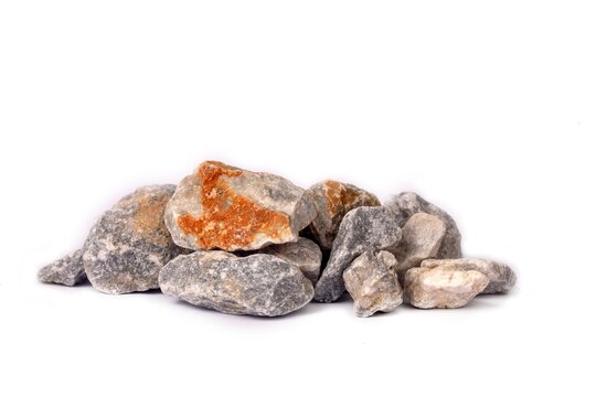 Collection of Rough Rocks with Orange Mineral Crystals.
