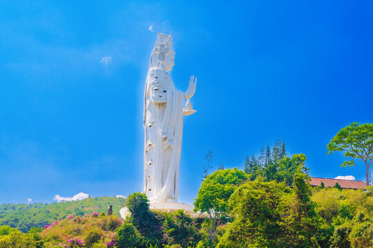 large white Buddhist statue of Lady Buddha at Linh An Pagoda in Dalat in Vietnam. A famous tourist destination is sacred place in Asia