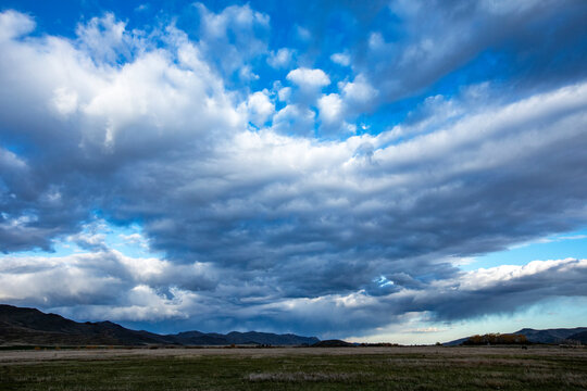 Dramatic skies over rural landscape