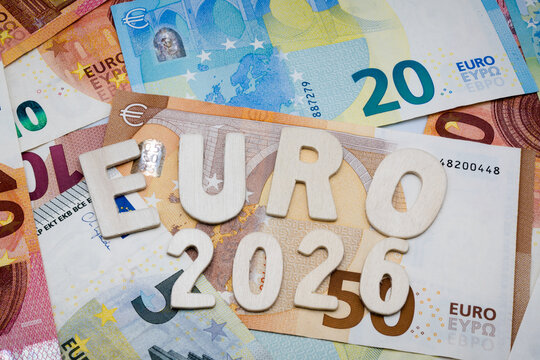 Euro currency, banknotes, and the inscription "Year 2026".

