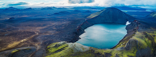 Aerial View of Iceland Highlands Crater Lake and Colorful Mountains © Lukas Gojda