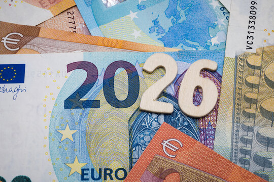 Euro currency, banknotes, and the inscription "Year 2026".
