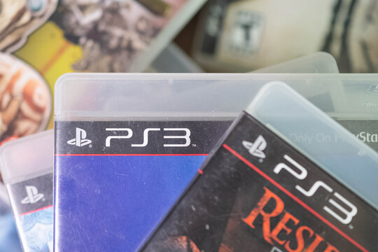 Playstation 3 Sony  logo on used playstation game box, copy space background image physical game, market collectors, second hand