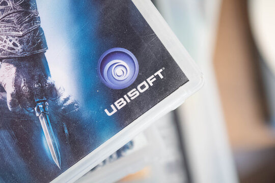 Ubisoft game developer logo on used playstation game box, copy space background image physical game, market collectors, second hand