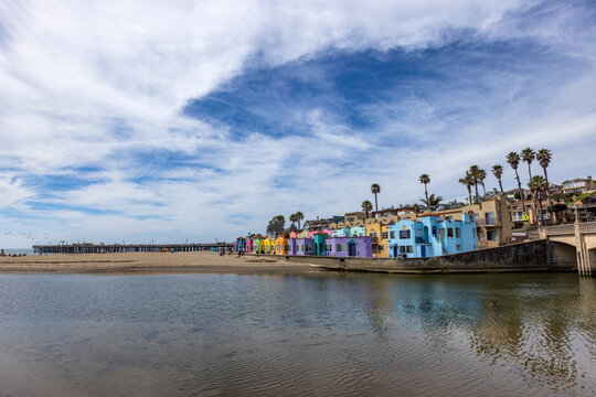 Colorful Venetian Court buildings and beach