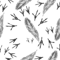 Fototapeta premium Seamless repeating pencil sketch pattern with feathers and bird tracks. Perfect for cottagecore wallpaper, nature-themed textile prints, and rustic home decor.