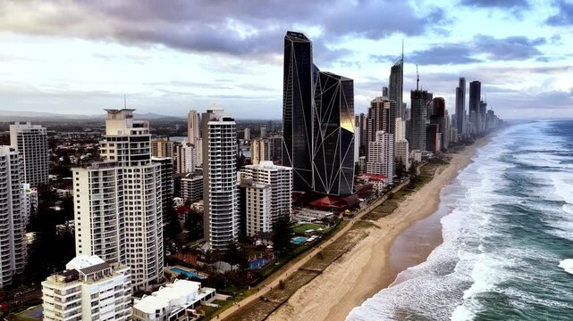 Sunlight aerial panorama of Gold Coast Surfers paradise Pacific ocean waterfront.