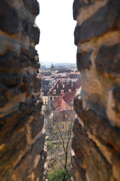 Prague cityscape seen through a gap between walls