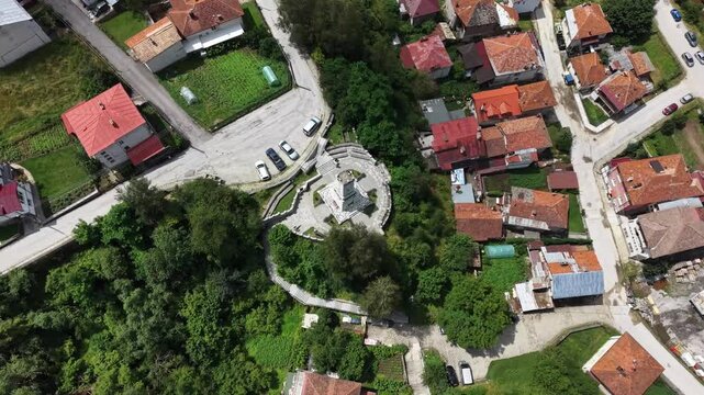 Top-down aerial shot of the Little Shipka war memorial monument in Chepelare town