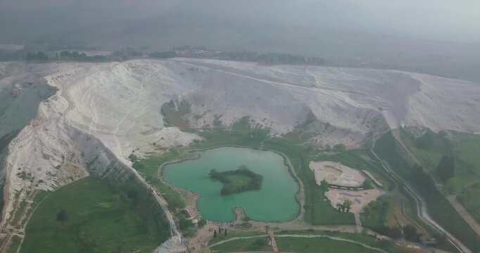 Drone Shot of Pamukkale Natural Park Lake at the Base of Cotton Castle