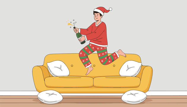 Excited young man in Santa hat jumping on a sofa and popping a bottle of sparkling champagne at Christmas.