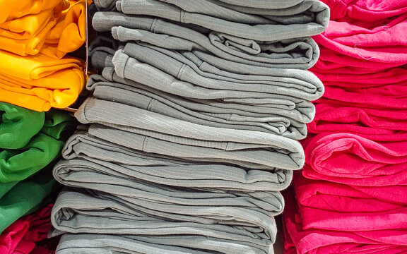 stack of colorful clothes