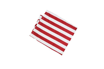 Fototapeta premium Red and White Striped Cotton Napkin Folded on White Background for Kitchen and Table Decor