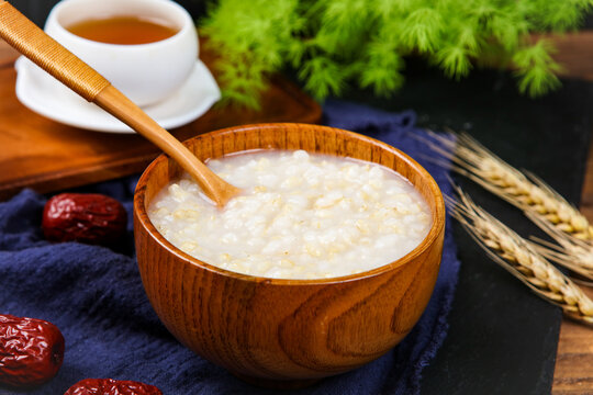 Healthy Brown Rice Congee In White Porcelain Bowl Red Jujube