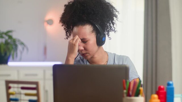 Tired Black Online Teacher Experiencing Stress and Burnout While Working Remotely From Home