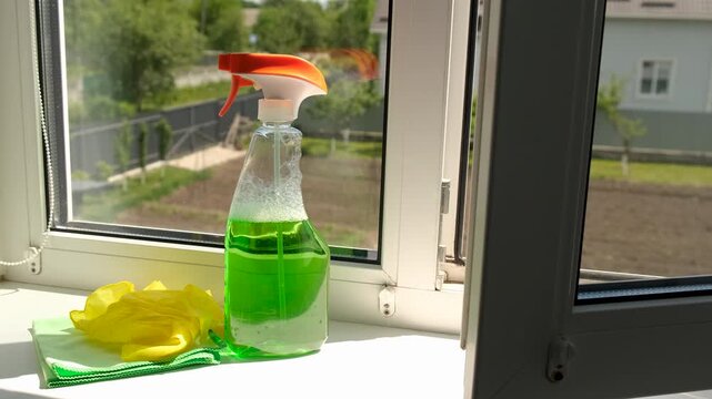 Washing windows spring cleaning. Selective focus.