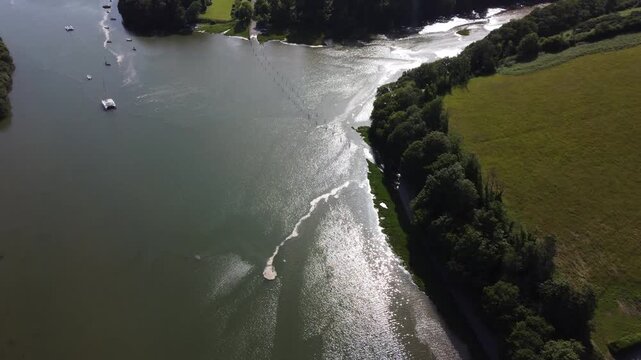 Aerial drone view of flooded tidal road in Aveton Gifford, South Devon, England