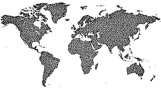 Abstract world map silhouette created from a pattern of small black oval shapes on white background