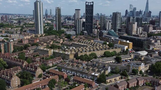 LONDON - Aerial of South London Elephant & Castle, Kennington towards the Shard and City of London Skyline. Upwards reveal. 