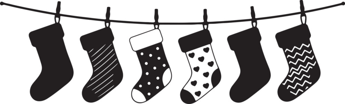 Set of Colorful Christmas Stockings Hanging on a Rope with Clothespins