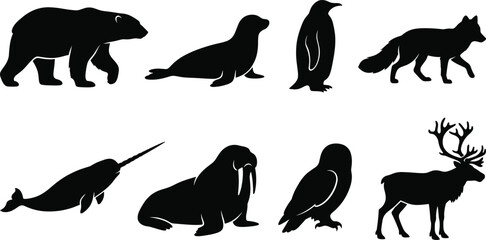 Set of arctic and polar animal black silhouettes featuring polar bear, penguin, walrus, narwhal, and reindeer © RitaRani