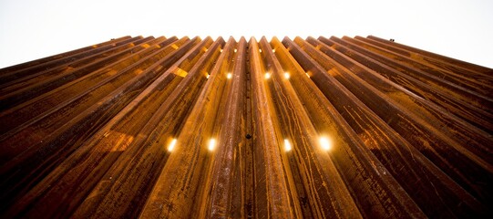 Obraz premium Rusted Corrugated Metal Sheets Industrial Burnt Orange Texture