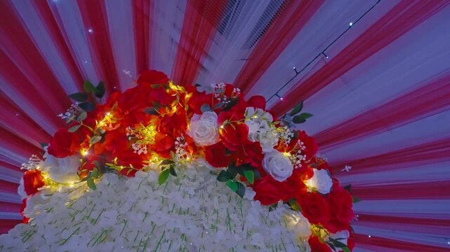 Elegant Floral Wedding Centerpiece with Red Roses and White Flowers