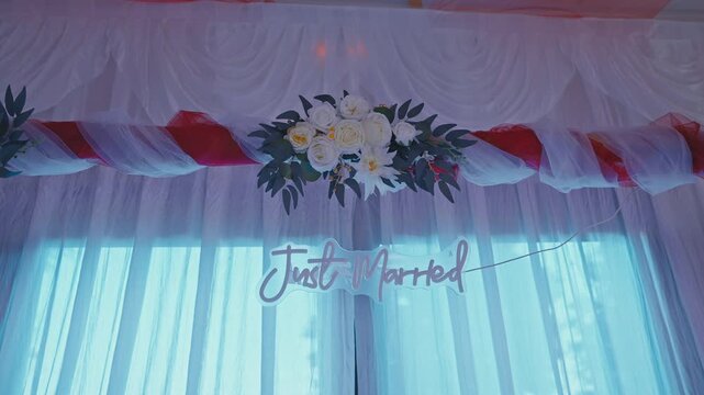 Elegant Just Married Sign with Floral Wedding Reception Decoration