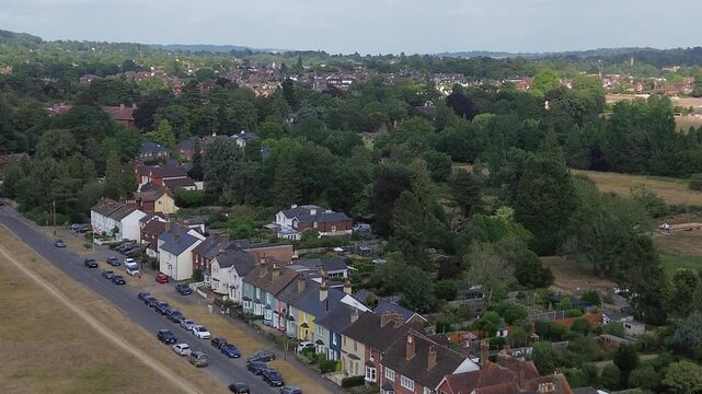 REIGATE, SURREY - UK:- Colourful terraced houses overlooking Reigate Heath.  Aesthetic old cottages in rural England, in the London commuter belt. 