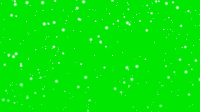 Festive animation of falling white snowflakes and winter snow particles on a green screen