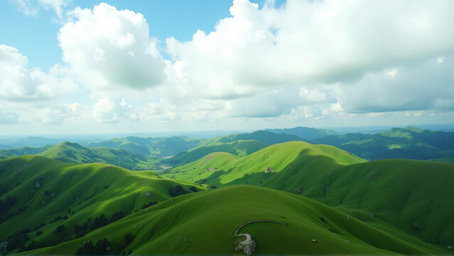 Drone captures serene rolling hills under dramatic white clouds with bright clean lighting and negative space