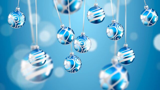 Festive animation of hanging blue Christmas baubles with white patterns against a blue background.