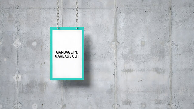A hanging sign displaying the concept of garbage in garbage out on a wall