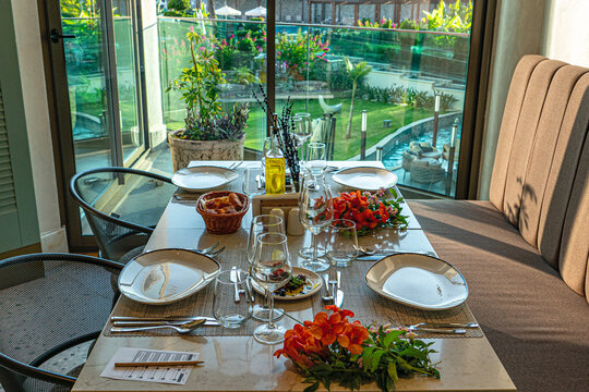 The beautiful view of cosy table ready for fine dining 