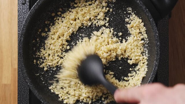 Panko and nuts fry together in pan, turning golden and crunchy. Crunchy topping adds texture to smooth cream soup or bisque. Crunchy topping pairs well with pumpkin, tomato or potato soup.