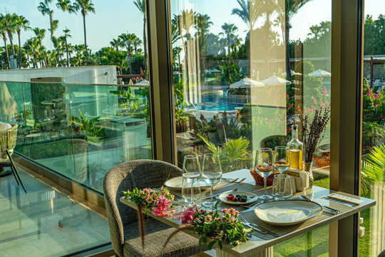 The beautiful view of cosy table ready for fine dining 