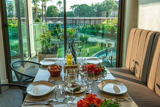 The beautiful view of cosy table ready for fine dining 