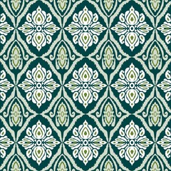 Fototapeta premium This fabric features a stunning fabric tribal-inspired Ikat pattern in rich cover full tones that contrast beautifully against a light background. The fabric of traditional Ikat artistry with a fabr 