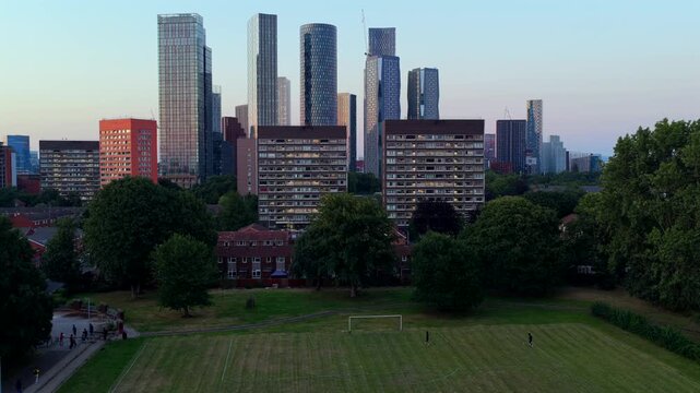 Aerial Video Over Barrack Park Football Pitch and Deansgate Manchester Skyline