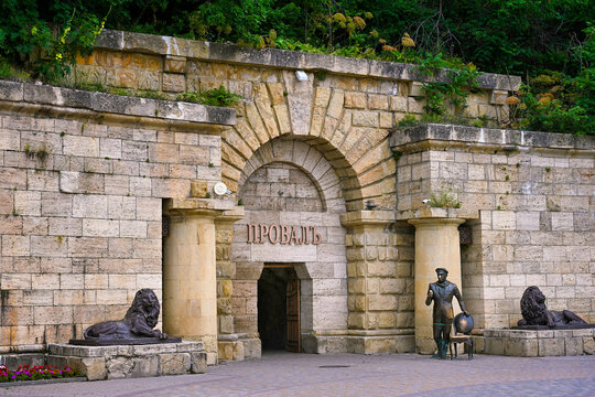 Entrance to the Proval Lake cave with a statue of Ostap Bender in Pyatigorsk, Stavropol region of Russia