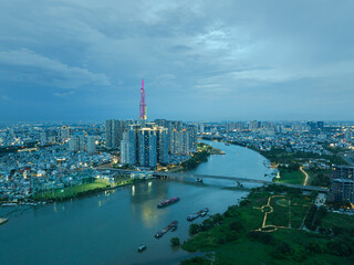Fototapeta premium Aerial View of Ho Chi Minh City Skyline and Saigon River
