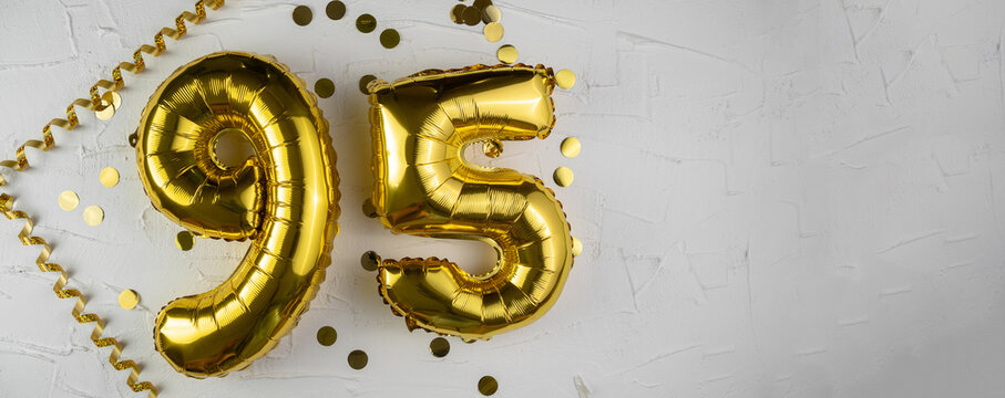 Yellow Gold foil balloon number ninety-five on white background. Birthday card with lettering 95. Anniversary concept. For anniversary, birthday, wedding event, new year celebration. Banner