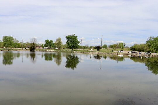 The quiet lake in the park on a sunny day.