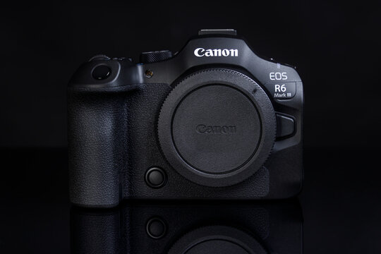 Varna , Bulgaria - July 12, 2026: Professional Canon EOS R6 Mark III Mirrorless Camera Body on Reflective Black Background, Sleek High-End Digital Imaging Equipment for Photographers